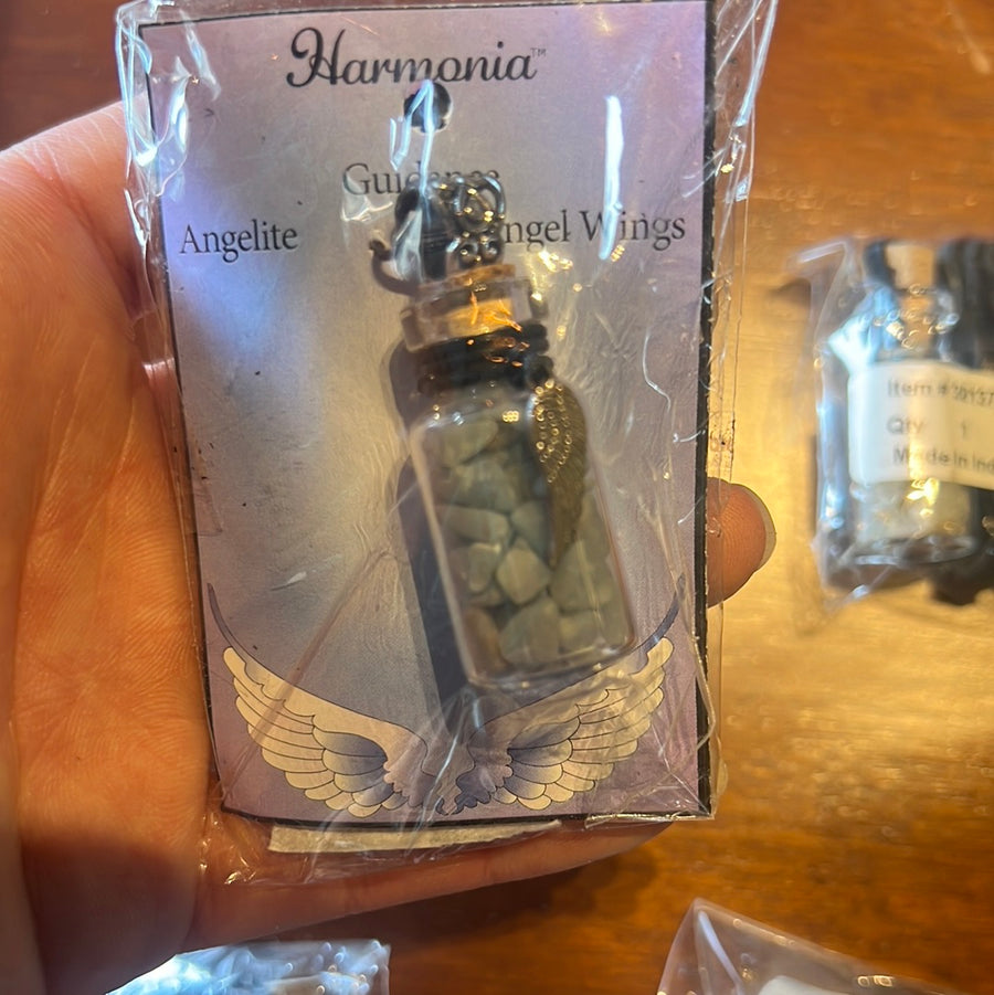 CRYSTALS IN BOTTLE