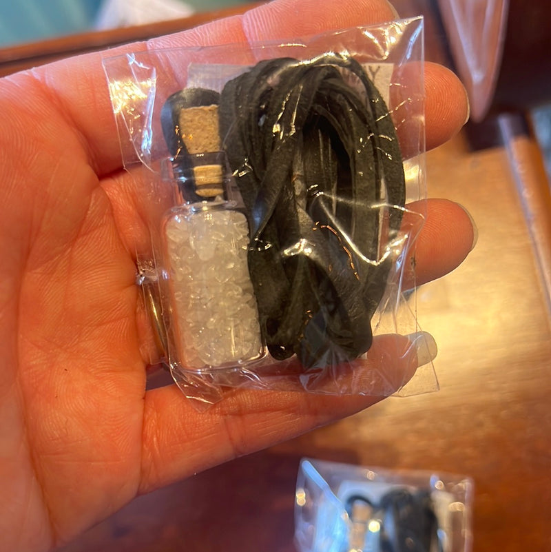 CRYSTALS IN BOTTLE