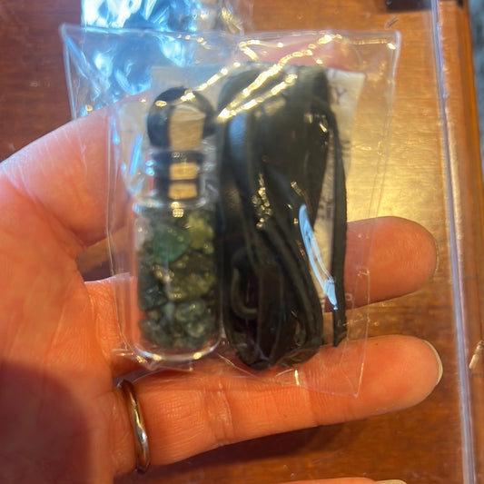 CRYSTALS IN BOTTLE